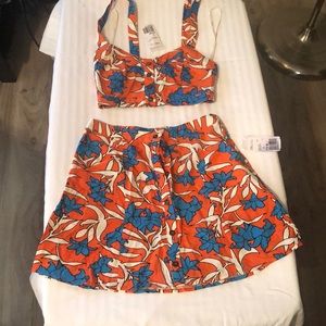 Matching orange and blue floral two piece set